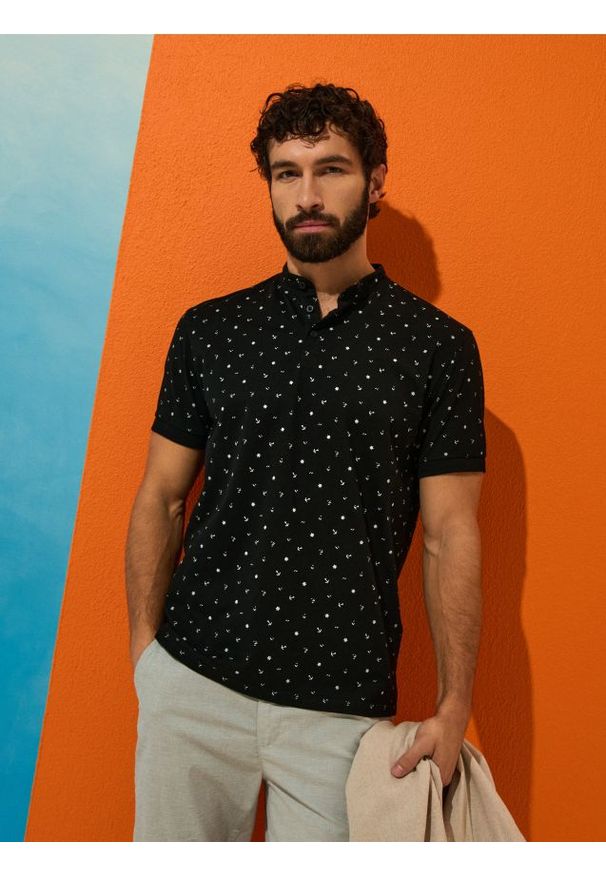 Sinsay - Bawełniana koszulka polo - czarny. Typ kołnierza: polo. Kolor: czarny. Materiał: bawełna