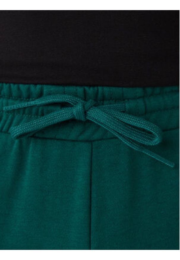 Adidas - adidas Spodnie dresowe Essentials Feel Cozy JE3858 Zielony Regular Fit. Kolor: zielony. Materiał: bawełna