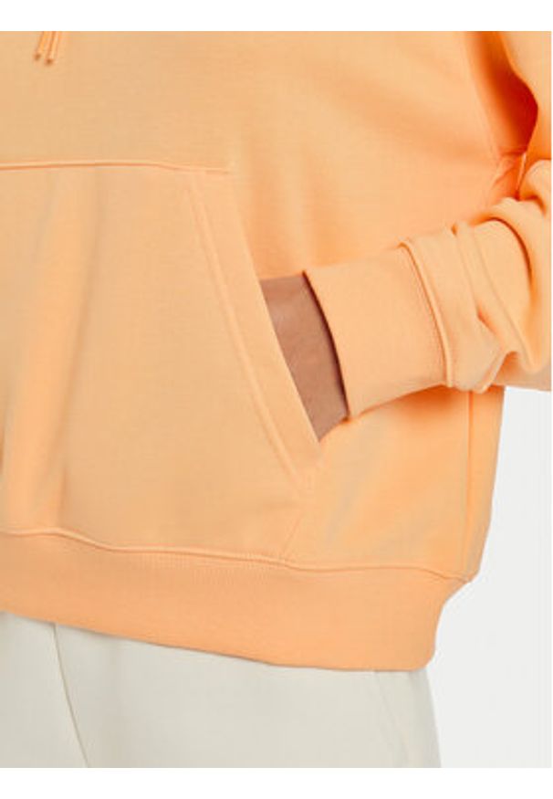 New Balance Bluza WT41507 Pomarańczowy Relaxed Fit. Kolor: pomarańczowy. Materiał: bawełna