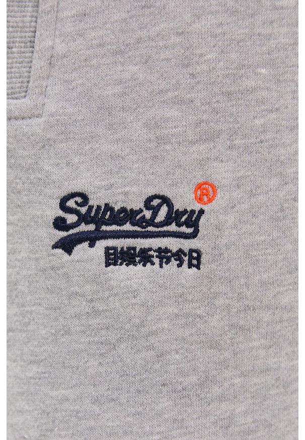 Superdry - Spodnie. Kolor: szary. Wzór: melanż