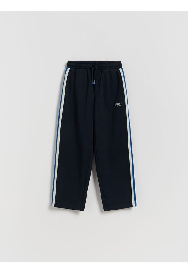 Reserved - Bawełniane spodnie - granatowy. Kolor: niebieski. Materiał: bawełna