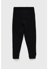 adidas Performance spodnie dziecięce H57518 kolor czarny z aplikacją. Okazja: na co dzień. Kolor: czarny. Materiał: bawełna, poliester, materiał. Wzór: aplikacja. Styl: casual #2