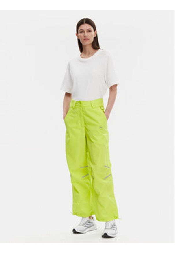 Adidas by Stella McCartney - adidas by Stella McCartney Spodnie dresowe Woven JG5783 Zielony Loose Fit. Kolor: zielony. Materiał: syntetyk