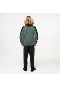 Dres dziecięcy Puma. Kolor: wielokolorowy, czarny, zielony. Materiał: dresówka. Styl: sportowy