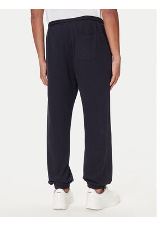 TOMMY HILFIGER - Tommy Hilfiger Spodnie dresowe UM0UM03627 Niebieski Regular Fit. Kolor: niebieski. Materiał: bawełna