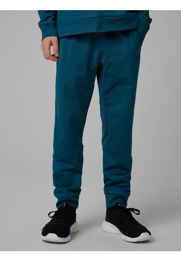 4f - 4F Spodnie sportowe szybkoschnące chłopięce - turkusowe 158/164 (12-14 lat). Kolor: turkusowy. Sezon: lato. Sport: fitness