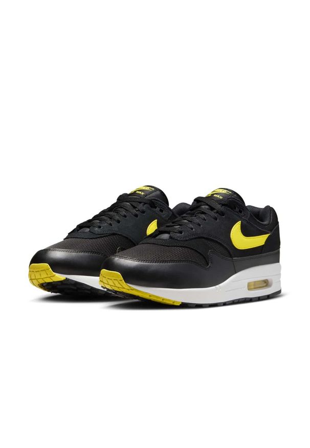 Nike Air Max 1 "Batman" Sneakersy męskie. Okazja: na co dzień. Kolor: czarny. Materiał: zamsz, skóra, materiał. Szerokość cholewki: normalna. Wzór: motyw z bajki. Model: Nike Air Max