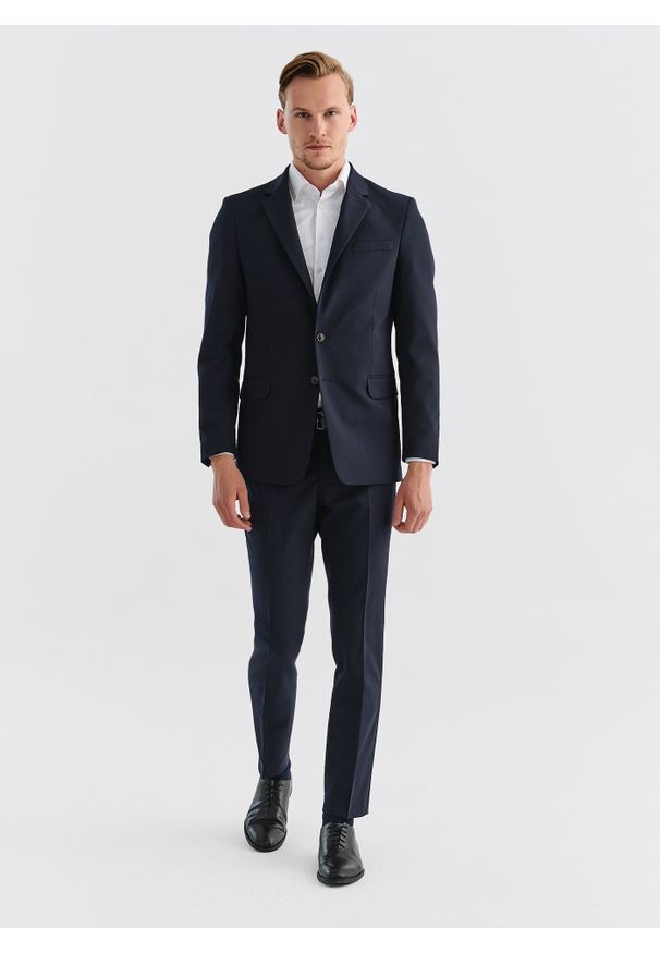 Pako Lorente - PAKO LORENTE – Gładkie granatowe spodnie garniturowe. Kolor: niebieski. Materiał: wełna, poliester, elastan. Wzór: gładki