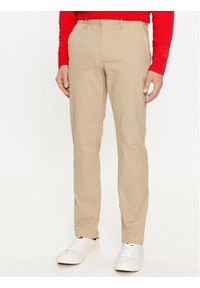 TOMMY HILFIGER - Tommy Hilfiger Chinosy Denton MW0MW24872 Beżowy Slim Fit. Kolor: beżowy. Materiał: bawełna