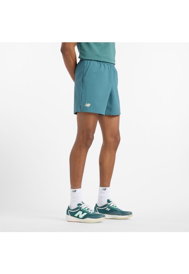 Spodenki męskie New Balance MS51402NUS – niebieskie. Kolor: niebieski. Materiał: materiał, lycra, tkanina, nylon. Sport: tenis