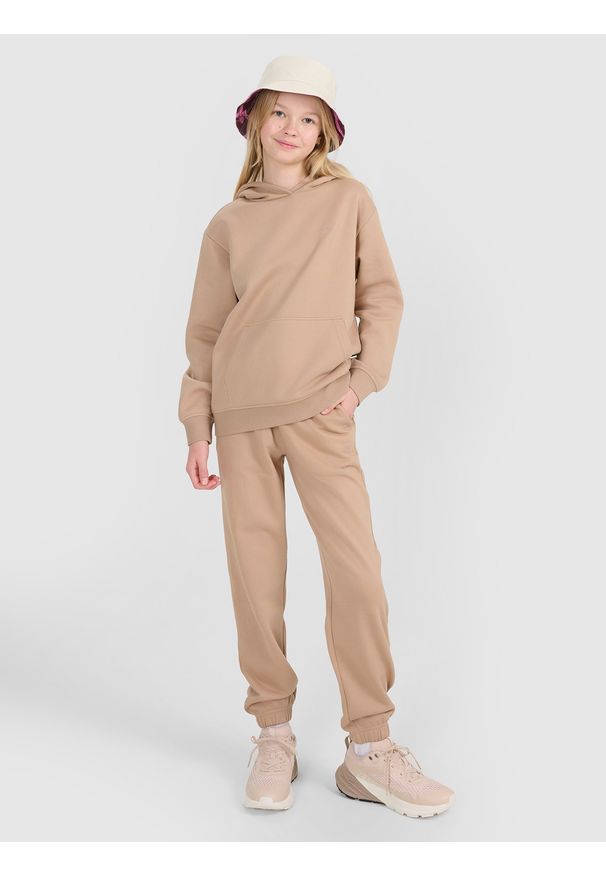 4f - 4F Spodnie dresowe joggery dziewczęce - beżowe 128 (7-8 lat). Okazja: na co dzień. Kolor: beżowy. Materiał: dresówka. Wzór: gładki, ze splotem. Sezon: lato. Styl: casual, sportowy
