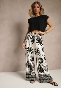 Renee - Czarno-Beżowe Szerokie Spodnie z Gumką w Pasie w Stylu Boho Evirami. Kolor: czarny. Sezon: lato. Styl: boho