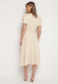 Born2be - Beżowa Sukienka Vices o Rozkloszowanym Kroju z Odpinanym Kwiatem 3D Rallarea. Kolor: beżowy. Wzór: kwiaty. Sezon: wiosna, lato #5