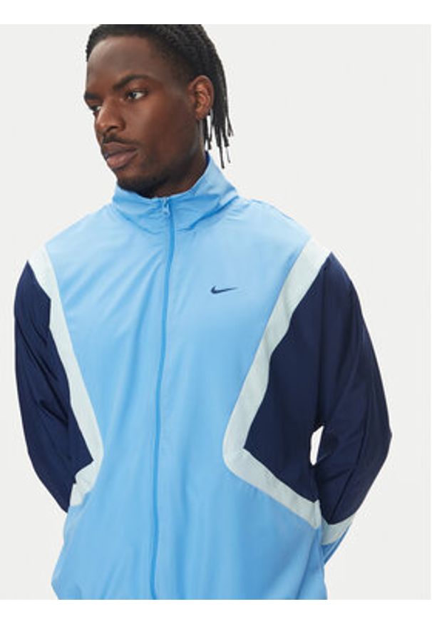 Nike Wiatrówka Icon FZ0248 Niebieski Relaxed Fit. Kolor: niebieski. Materiał: syntetyk