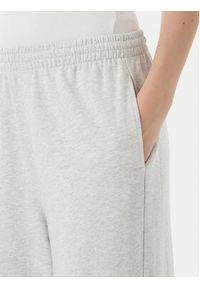 TOMMY HILFIGER - Tommy Hilfiger Spodnie dresowe UW0UW06180 Szary Wide Leg. Kolor: szary. Materiał: bawełna #5