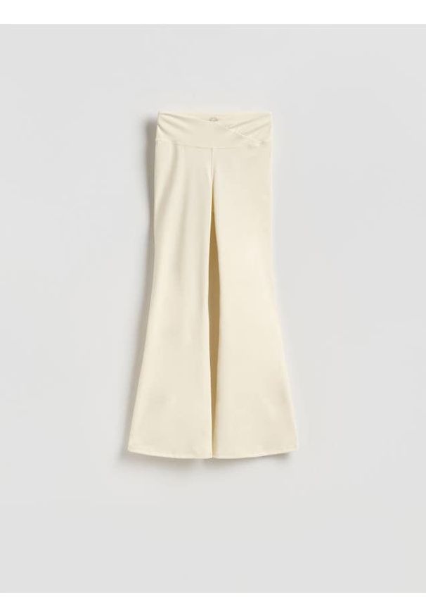 Reserved - Spodnie flare - złamana biel. Materiał: dzianina