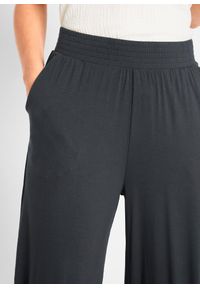 bonprix - Spodnie z dżerseju 7/8, z lejącej mieszanki wiskozy. Kolor: czarny. Materiał: jersey, wiskoza #3
