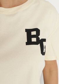 Born2be - Jasnożółty Bawełniany T-shirt Oversize o Krótkim Kroju Zariona. Okazja: na co dzień. Kolor: żółty. Materiał: bawełna. Długość: krótkie. Wzór: aplikacja. Styl: klasyczny, elegancki, casual #3