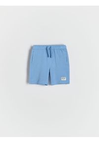 Reserved - Bawełniane szorty - niebieski. Kolor: niebieski. Materiał: bawełna. Wzór: gładki