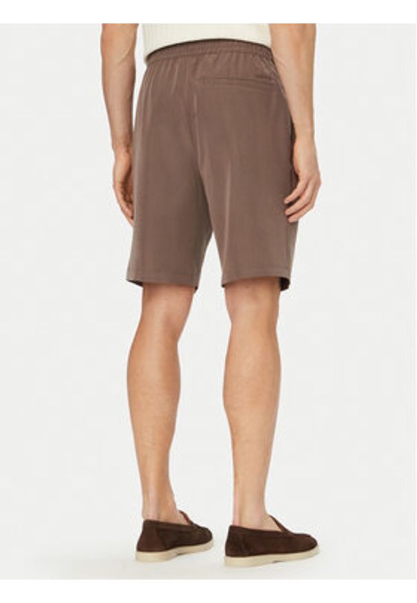 Calvin Klein Szorty materiałowe LV04LF614G Brązowy Relaxed Fit. Kolor: brązowy. Materiał: syntetyk