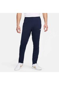 Nike - Spodnie sportowe męskie Dri-FIT Park 20 Knit Pants. Kolor: niebieski, wielokolorowy, biały. Materiał: poliester. Technologia: Dri-Fit (Nike). Sport: piłka nożna