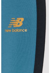 New Balance Legginsy WP13501SEA damskie kolor turkusowy z aplikacją. Stan: podwyższony. Kolor: turkusowy. Materiał: dzianina. Wzór: aplikacja