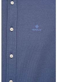 GANT - Gant Koszula męska kolor granatowy regular z kołnierzykiem button-down. Okazja: na co dzień. Typ kołnierza: button down. Kolor: niebieski. Materiał: materiał, tkanina, dzianina. Długość rękawa: długi rękaw. Długość: długie. Wzór: gładki. Styl: casual