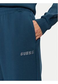 Guess Spodnie dresowe V4BB13 K7UW2 Niebieski Regular Fit. Kolor: niebieski. Materiał: wiskoza #3