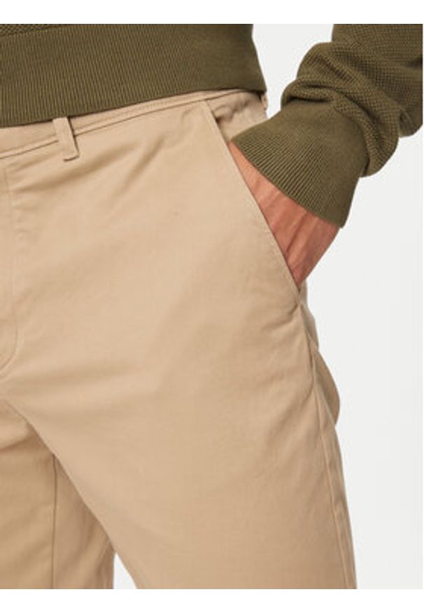 TOMMY HILFIGER - Tommy Hilfiger Chinosy Denton MW0MW37873 Beżowy Slim Fit. Kolor: beżowy. Materiał: bawełna