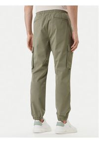 Calvin Klein Jeans Joggery Comfort LV04RD608G Beżowy Skinny Fit. Kolor: beżowy. Materiał: bawełna #5