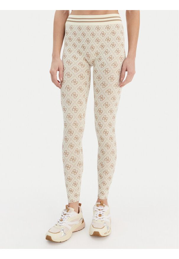 Guess Spodnie materiałowe 179838 Beżowy Slim Fit. Kolor: beżowy. Materiał: syntetyk