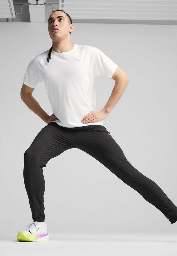 Puma - Męskie spodnie RUN VELOCITY o zwężanym kroju PUMA Black. Kolor: czarny. Sport: bieganie