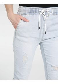 Unisono - Spodnie - jeansy. Materiał: jeans #2