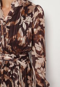 Born2be - Beżowa Rozkloszowana Sukienka z Wiązanym Paskiem i Metaliczną Nicią Nalirina. Okazja: na co dzień. Typ kołnierza: dekolt w kształcie V. Kolor: beżowy. Materiał: elastan, wiskoza. Wzór: aplikacja. Typ sukienki: rozkloszowane, proste. Styl: klasyczny, casual, elegancki #6