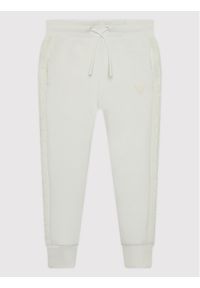 Guess Spodnie dresowe J2YQ24 FL03S Biały Regular Fit. Kolor: biały. Materiał: syntetyk #1