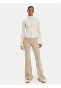 Adidas - adidas Legginsy Essentials KD3850 Beżowy Flared Leg. Kolor: beżowy. Materiał: wiskoza #5