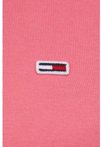 Tommy Jeans bluza damska kolor różowy z kapturem gładka. Okazja: na co dzień. Typ kołnierza: kaptur. Kolor: różowy. Materiał: bawełna. Wzór: gładki. Styl: casual