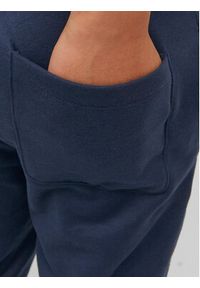 Jack&Jones Junior Spodnie dresowe 12237403 Granatowy Slim Fit. Kolor: niebieski. Materiał: syntetyk, dresówka, bawełna #2
