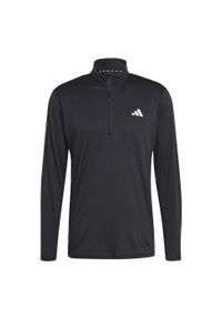 Adidas - Train Essentials Seasonal Training 1/4-Zip Long Sleeve Tee. Kolor: czarny, wielokolorowy, biały. Materiał: materiał. Wzór: motyw zwierzęcy, paski