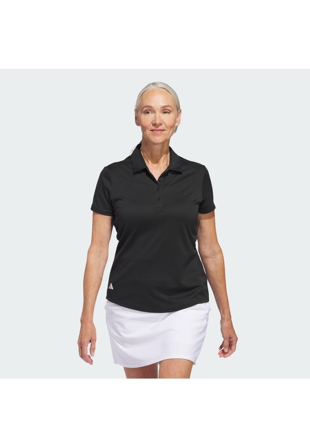 Adidas - Koszulka polo Women's Solid Performance Short Sleeve. Typ kołnierza: polo. Kolor: czarny. Materiał: materiał. Styl: klasyczny