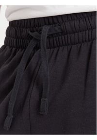 Under Armour Spodnie dresowe Ua Rival Fleece Colorblock 6003954 Czarny Loose Fit. Kolor: czarny. Materiał: bawełna