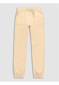 COCCODRILLO - Coccodrillo Spodnie dresowe WC3120103SKK Beżowy Slim Fit. Kolor: beżowy. Materiał: dresówka, bawełna