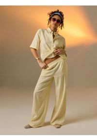 Sinsay - Spodnie wide leg z domieszką lnu - żółty. Kolor: żółty #1