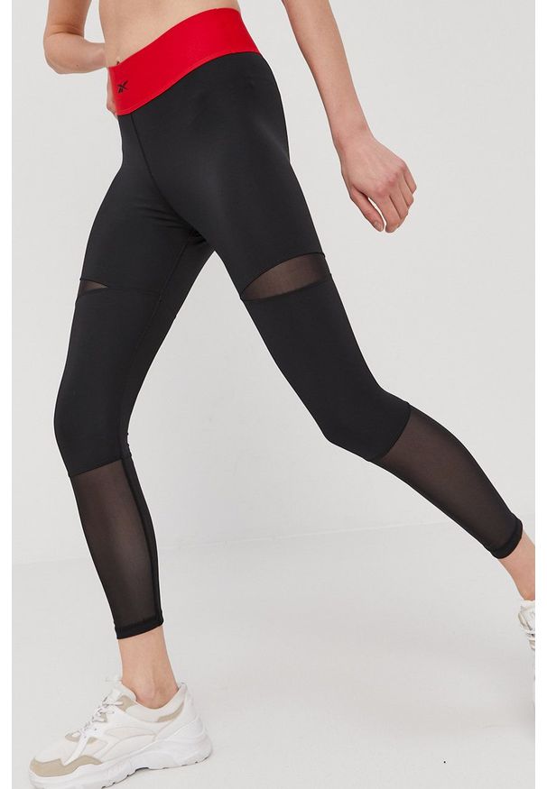 Reebok Classic - Legginsy. Stan: podwyższony. Kolor: czarny