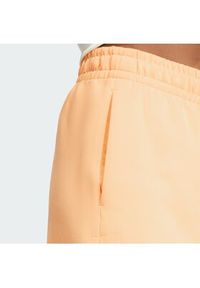 Adidas - adidas Szorty sportowe Soft Lux KA6998 Pomarańczowy Loose Fit. Kolor: pomarańczowy. Materiał: syntetyk #3