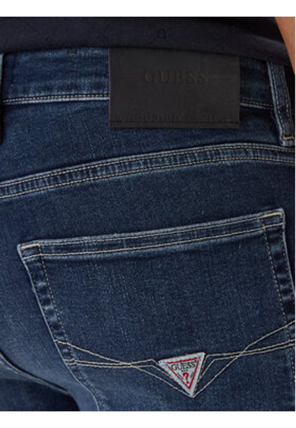 Guess Jeansy M6RAS2 D0632 Niebieski Slim Tapered Fit. Kolor: niebieski