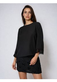 Sinsay - Bluzka z ozdobną koronką - czarny. Kolor: czarny. Materiał: koronka. Wzór: koronka