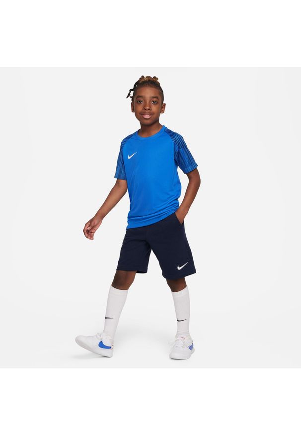 Spodnie treningowe chłopięce Nike Park 20. Kolor: biały, brązowy, niebieski, czarny, wielokolorowy. Długość: krótkie. Sport: piłka nożna