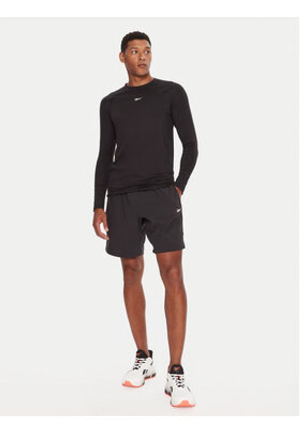 Reebok Koszulka techniczna Ls Muscle Tee RK25176CCM Czarny Regular Fit. Kolor: czarny. Materiał: syntetyk
