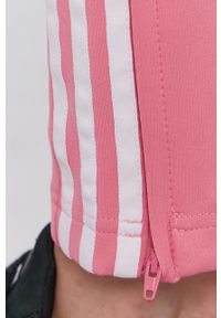 adidas Originals - Spodnie. Kolor: różowy. Materiał: materiał, dzianina. Wzór: aplikacja #4